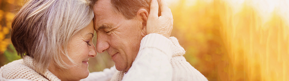 "nurse listening to patients heart"