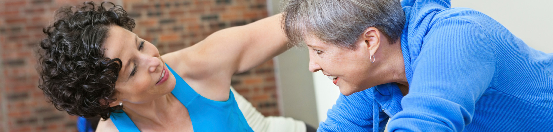 "nurse listening to patients heart"